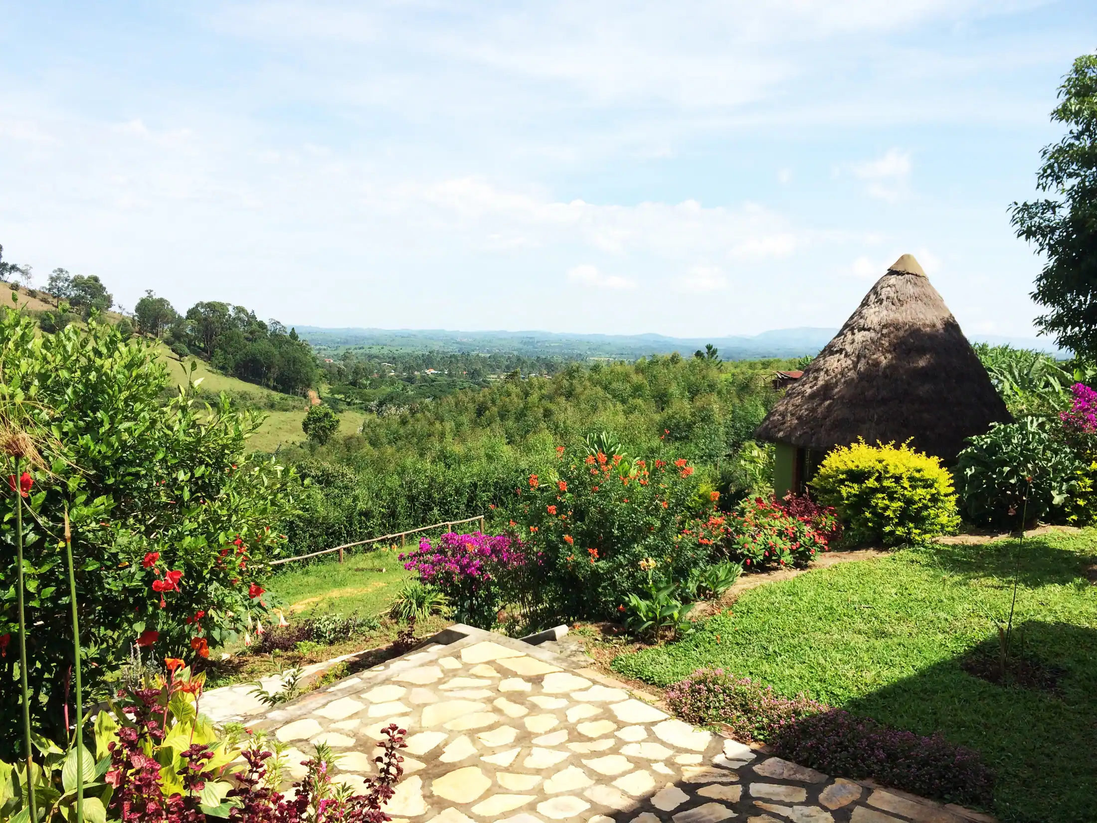 A thatched cottage among Nyore’s gardens, overlooking the hills of south-western Uganda.