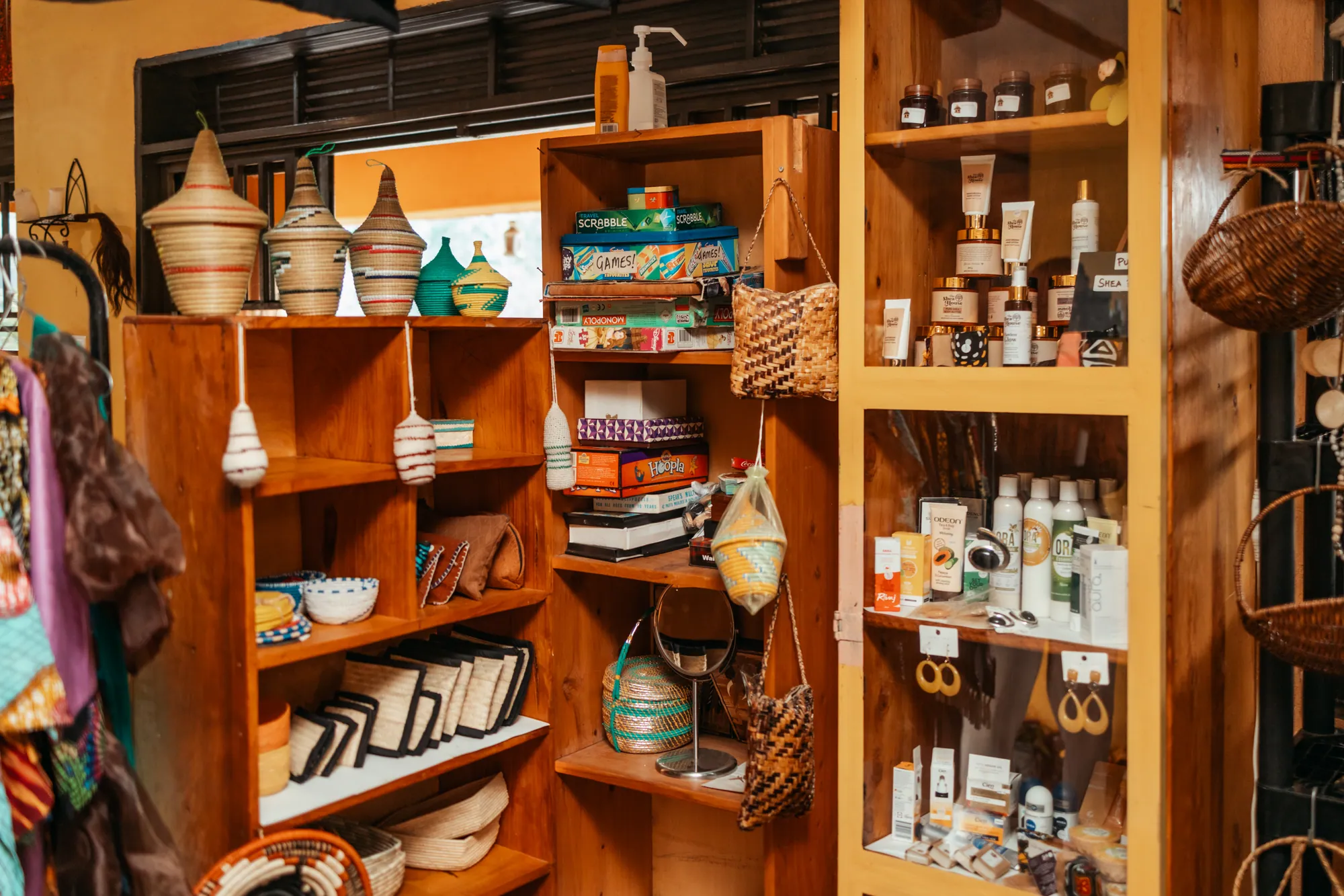 Shelves of woven baskets, crafts and gifts in the Nyore shop.